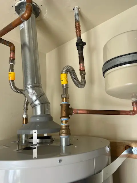 Water heater installation and plumbing repair in International Gardens